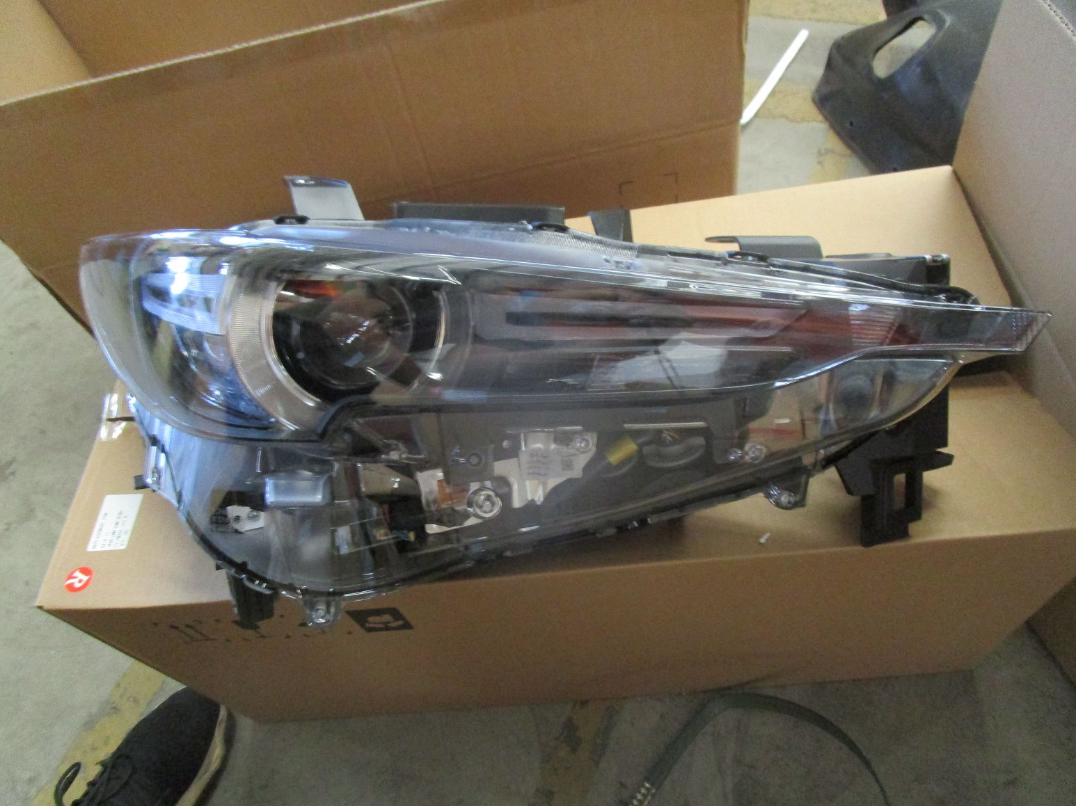Mazda KB8N51040 Headlamp